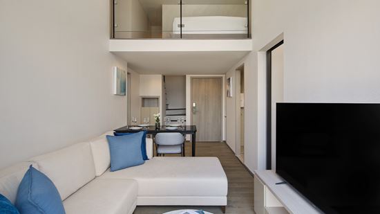 Grand Deluxe Two Bedroom Loft Corner - Open-Plan Living and Dining Space